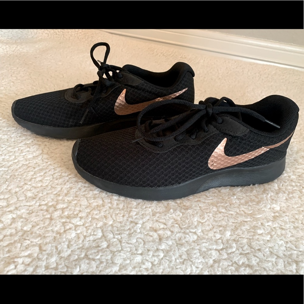 Nike tennis shoes with Rose Gold!  9 1/2